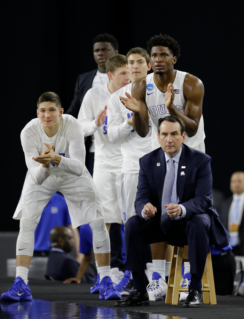 Illustration for article titled Eight Photos Of Coach K Sitting On A Lil' Stool